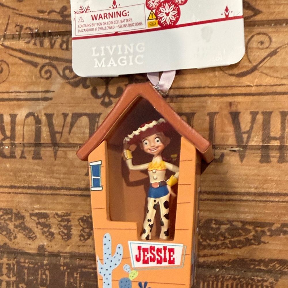 Disney Jessie Figure Ornament in Brown, tan, blue, yellow, red